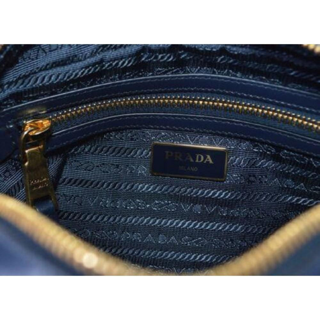 Prada Tessuto Nylon Blue Zip Calf Leather Cross Body Bag – Queen Bee of  Beverly Hills