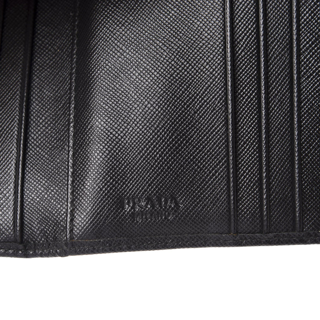 prada saffiano leather wallet with a money clip added to it